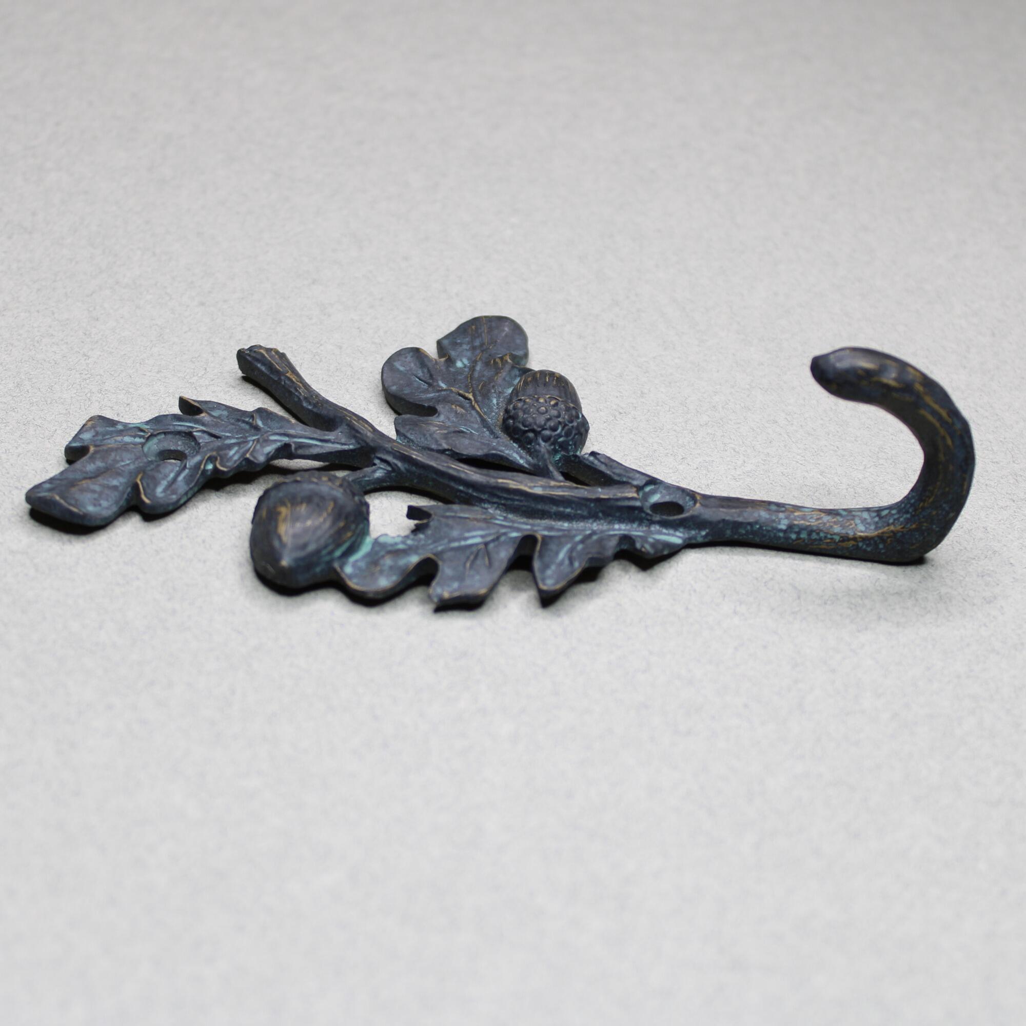 Top view of nature inspired botanical wall hook for coats and hats in rustic style