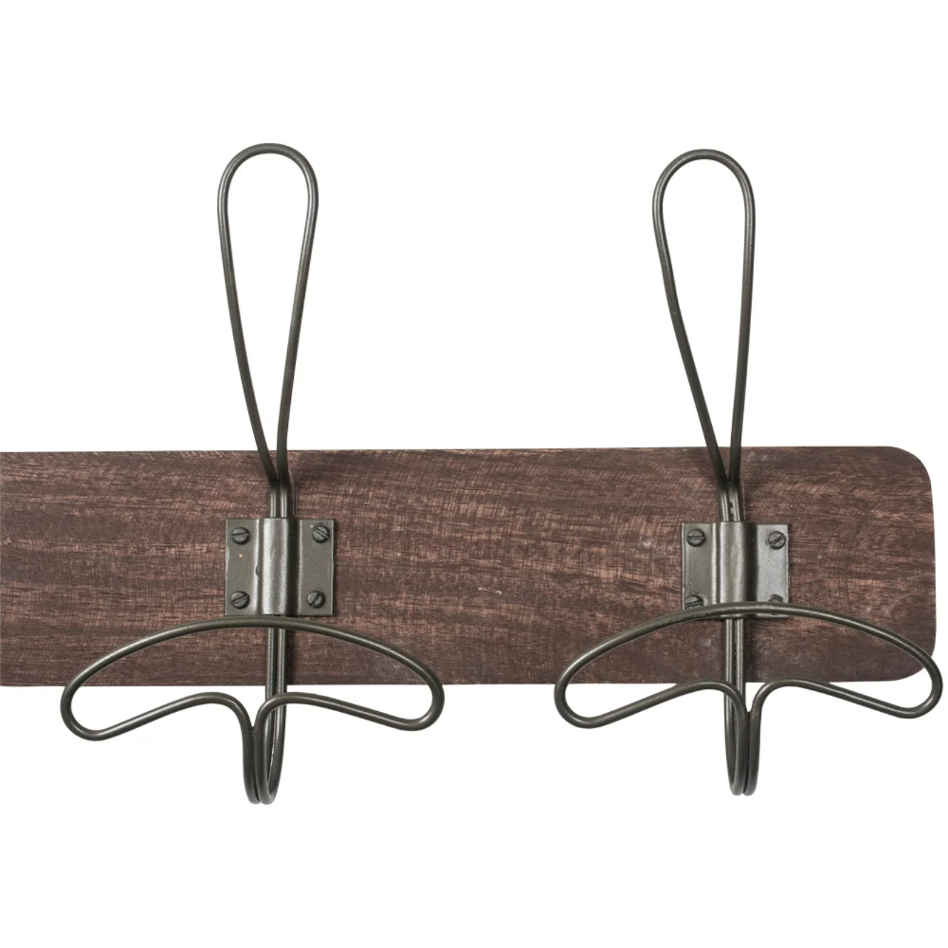 Closeup of a vintage coat rack focusing on the school style wire hanger hooks