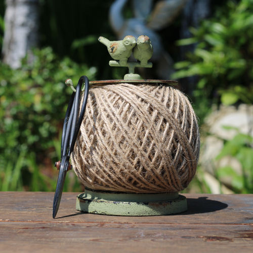 Garden string holder with scissors