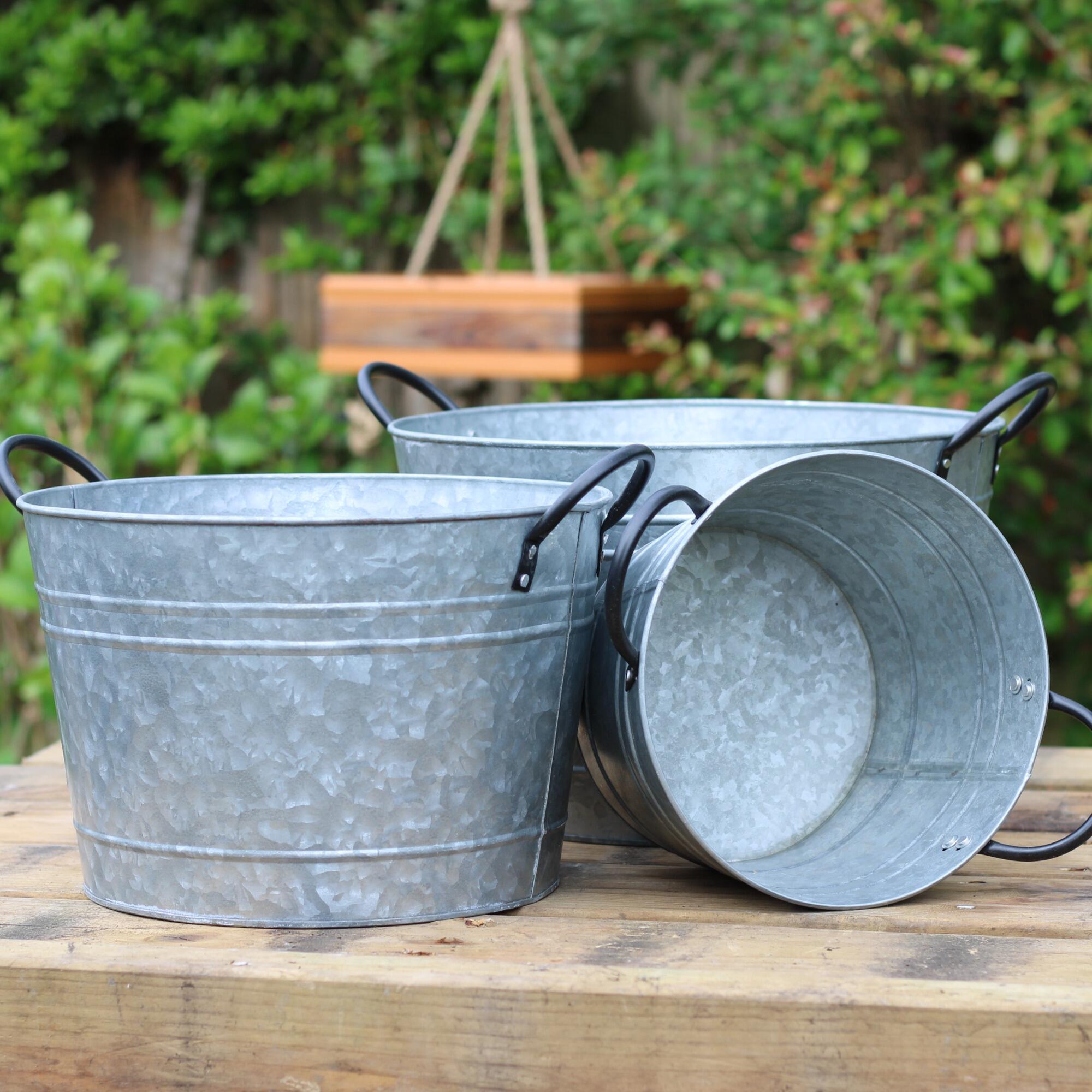 Set of 3 zincl garden planter tubs.