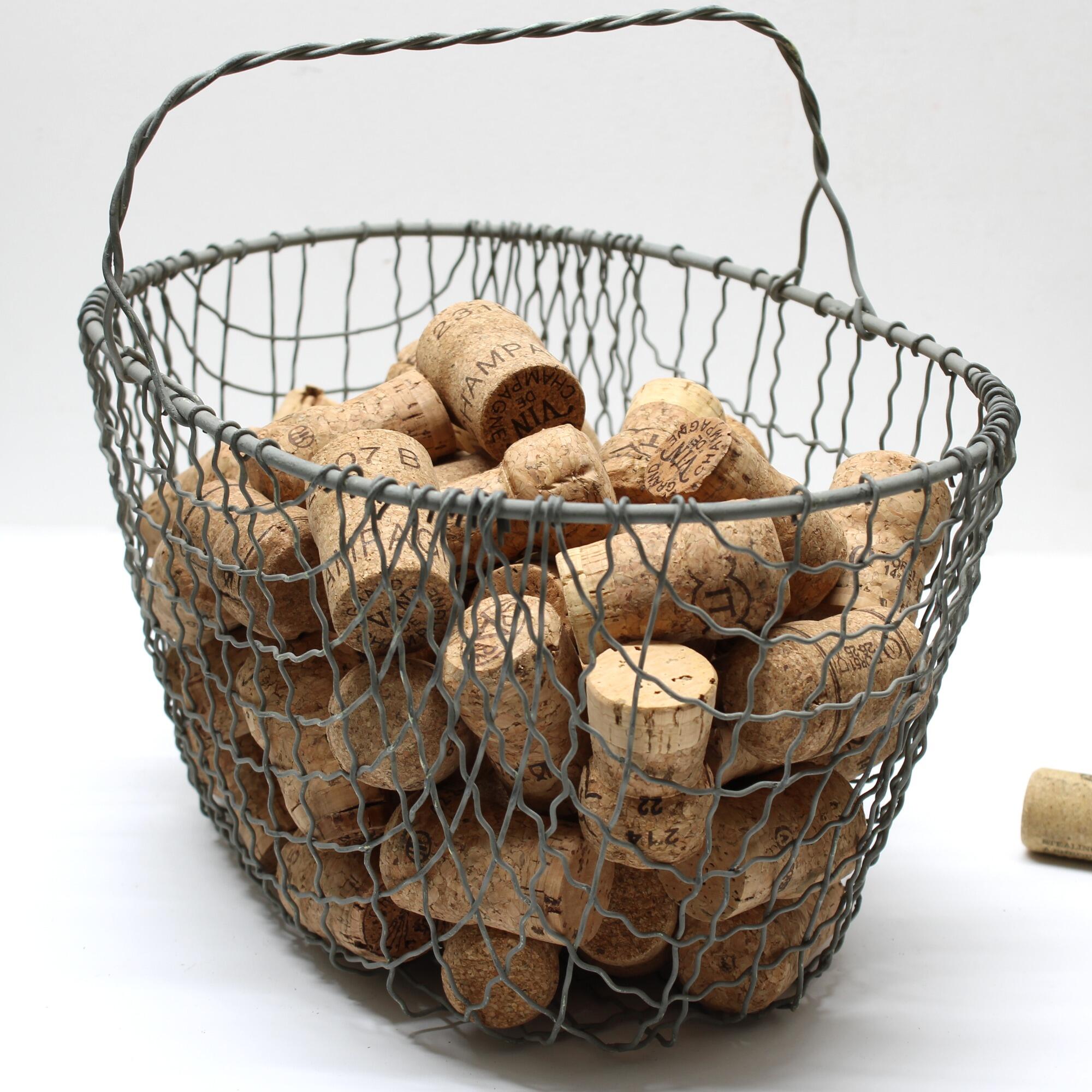 wire basket use to store wine bottle corks