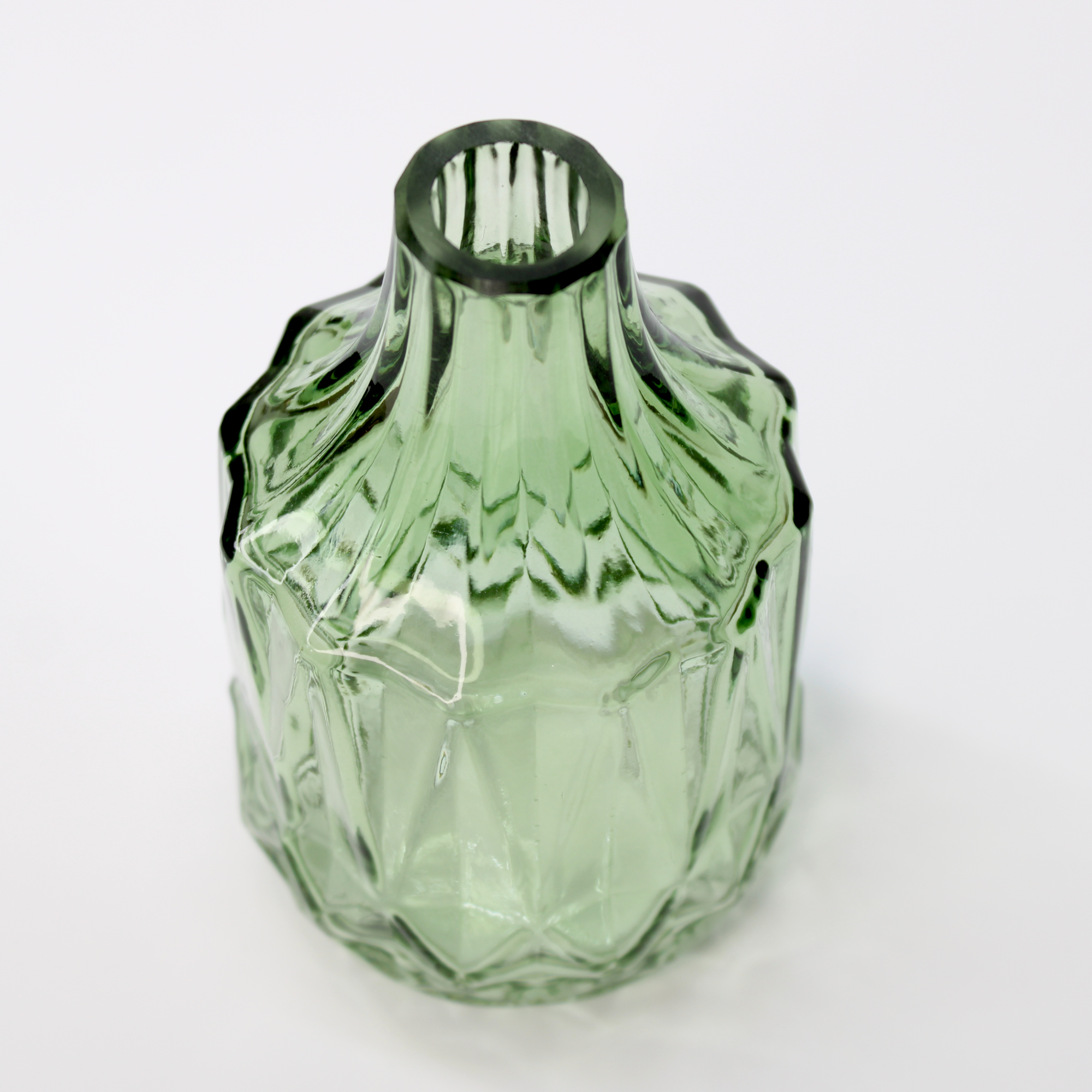 tiny flower vase with textured green glass