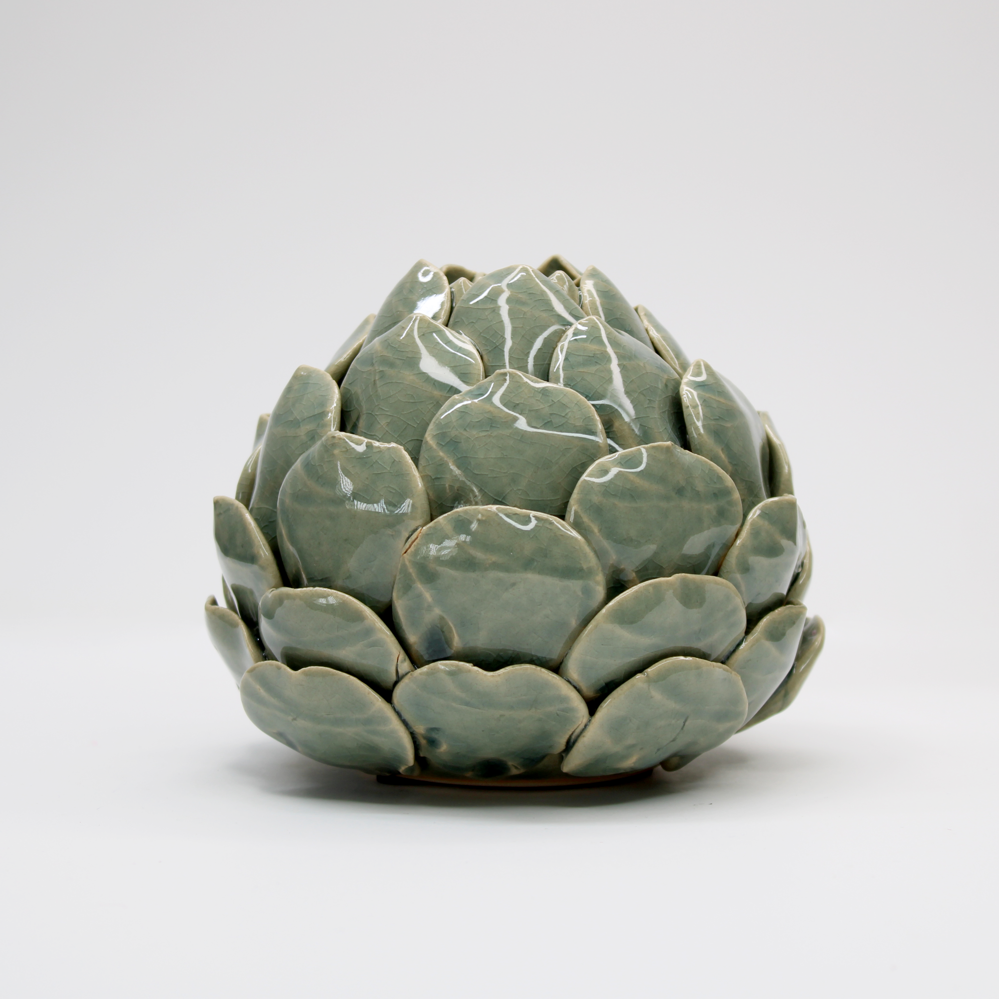sculpted artichoke candle holder