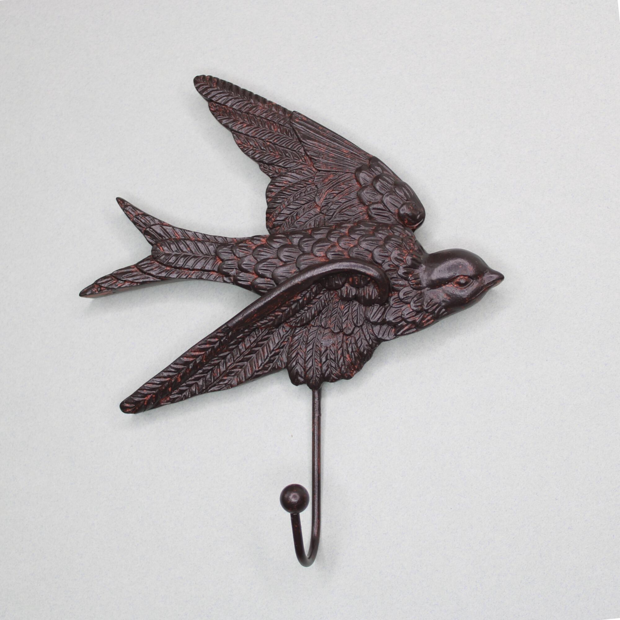 Detailed view of a flying sparrow decorative wall hanger showing intricate feather textures and a hand-painted patina.