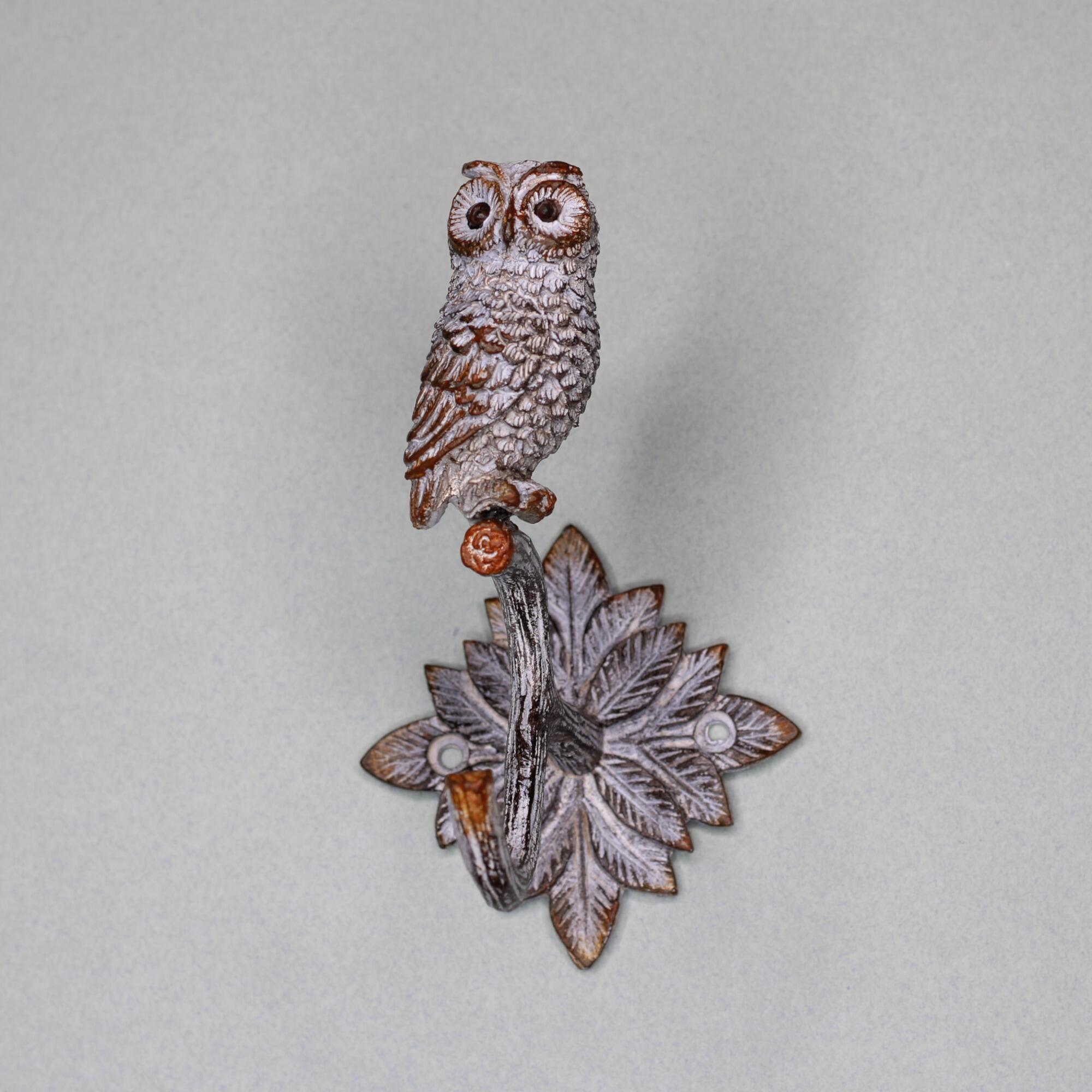 Decorative owl coat hook centered