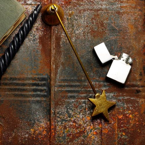 Long handled candle snuffer with gold antique finish