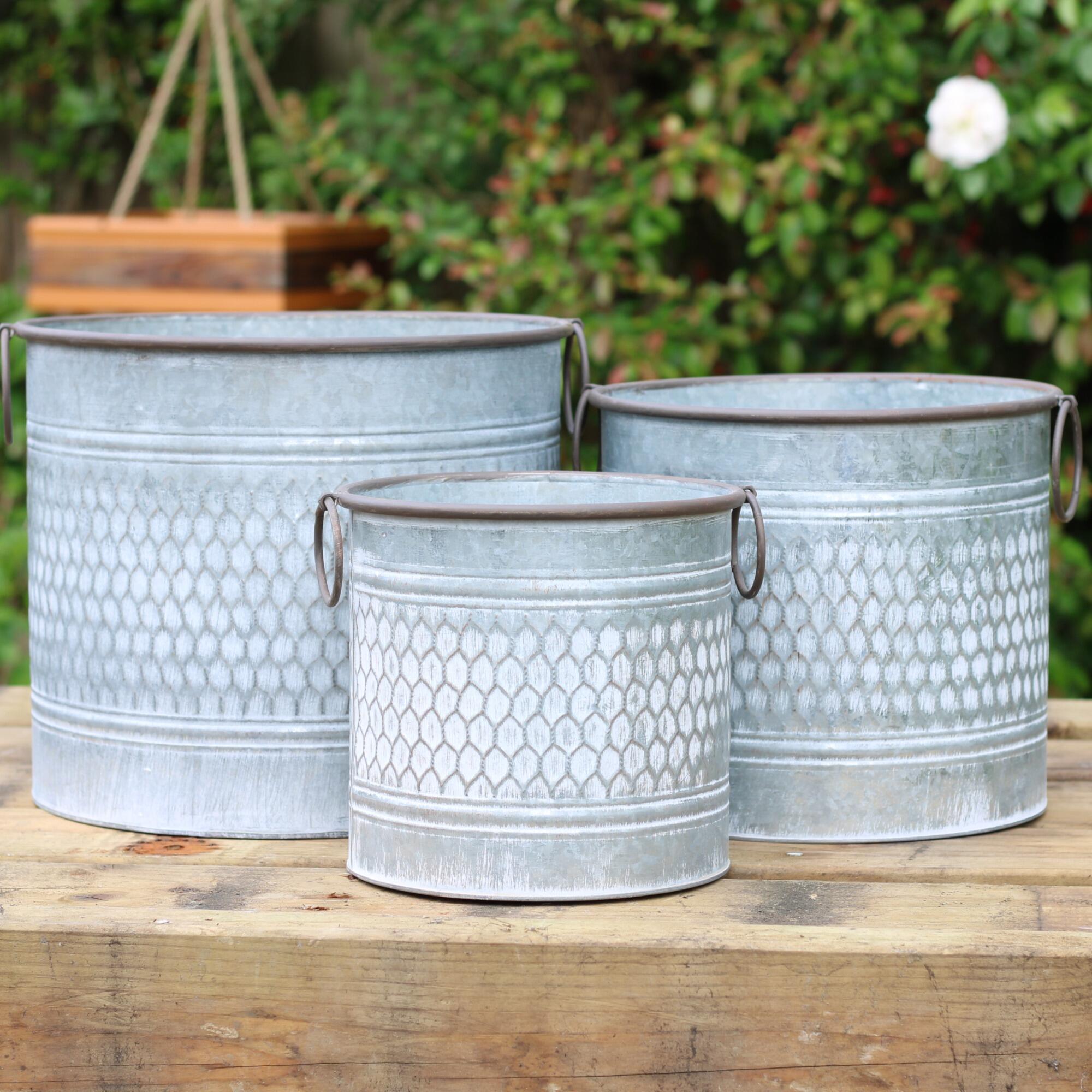 Set of three vintage garden planters