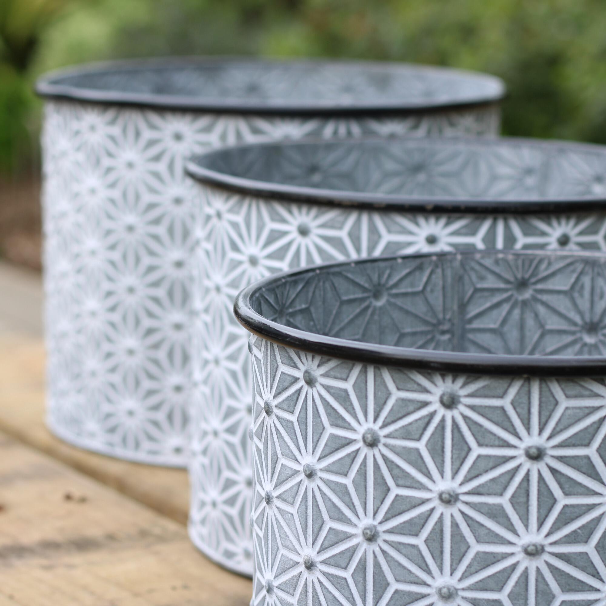 Garden planters with distressed antique grey / white embossing