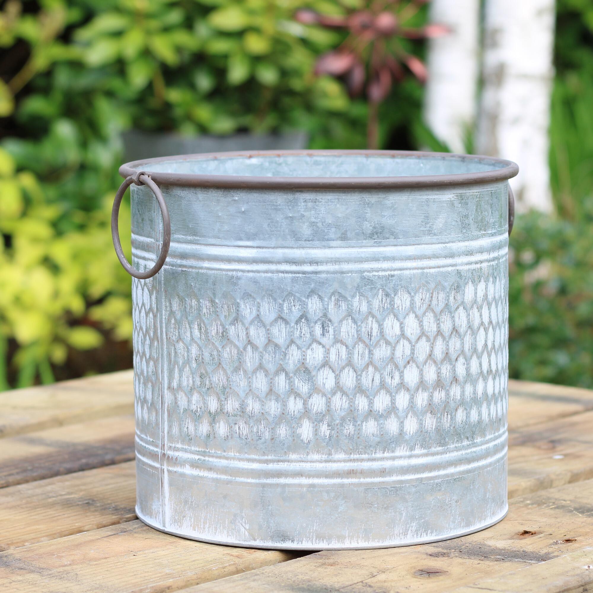Metal garden planter with embossed texture