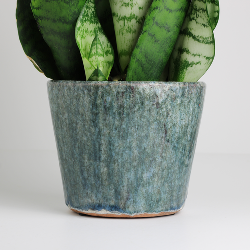 rustic terracotta plant pot with weathered glaze