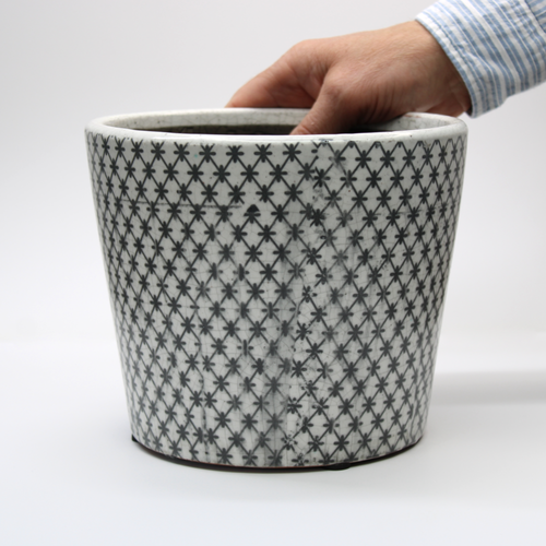 terracotta pot with a monochromatic vintage lattice pattern