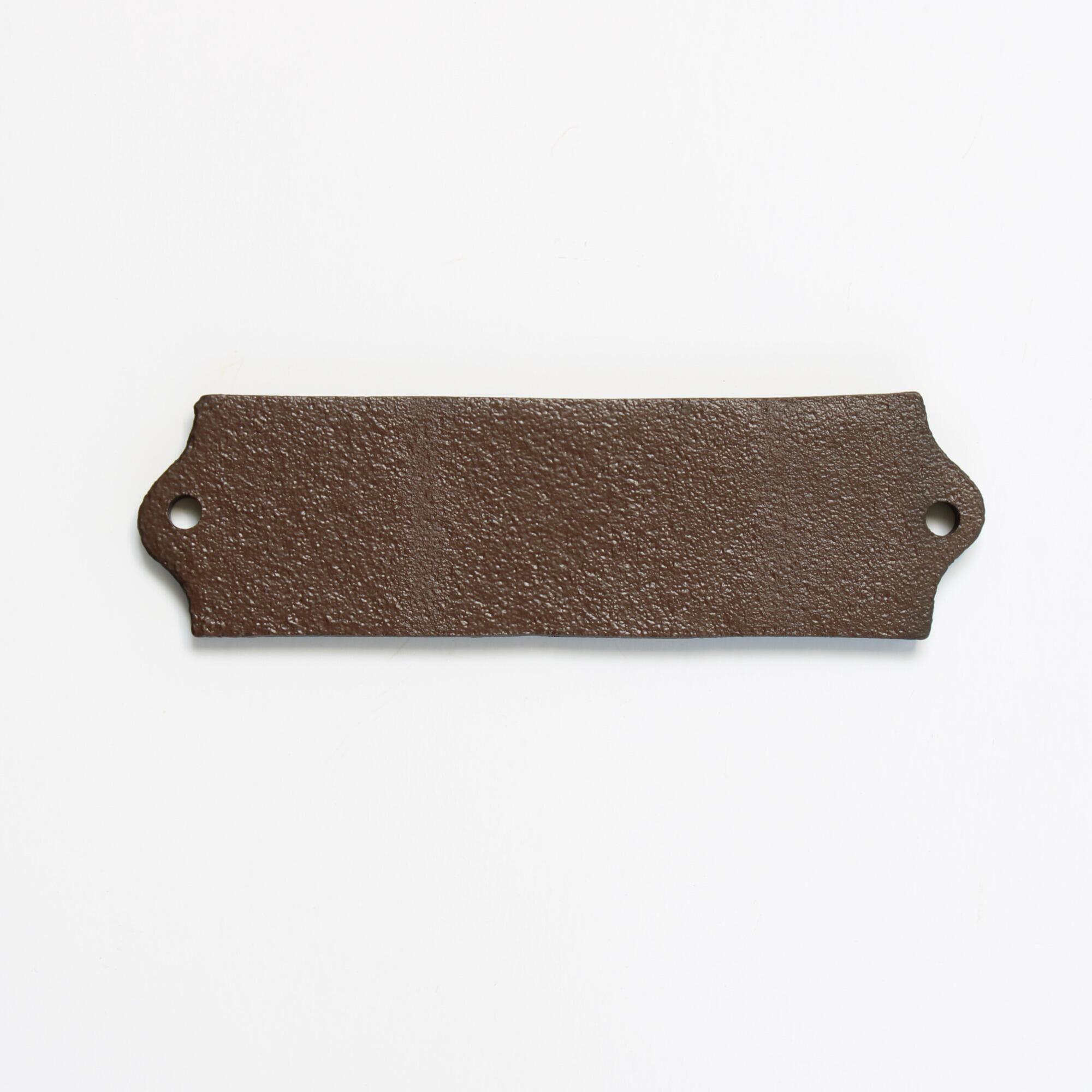 Revers side of a cast iron antique style washroom plaque