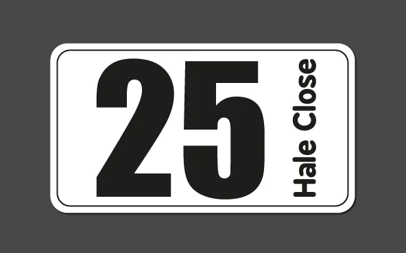 white sticker with black number 25