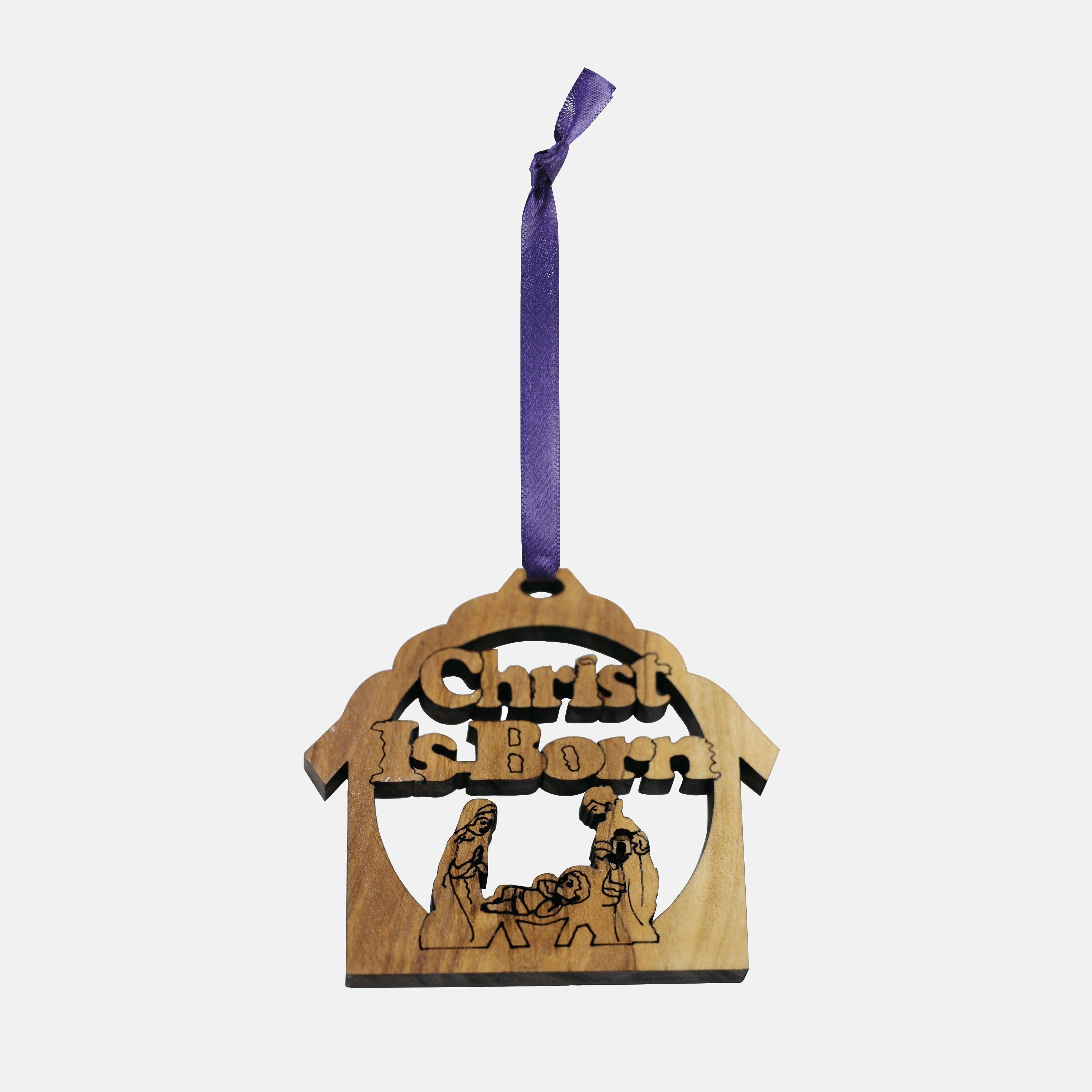 Charity Christmas Decorations_Olive Wood Christ is Born Decoration