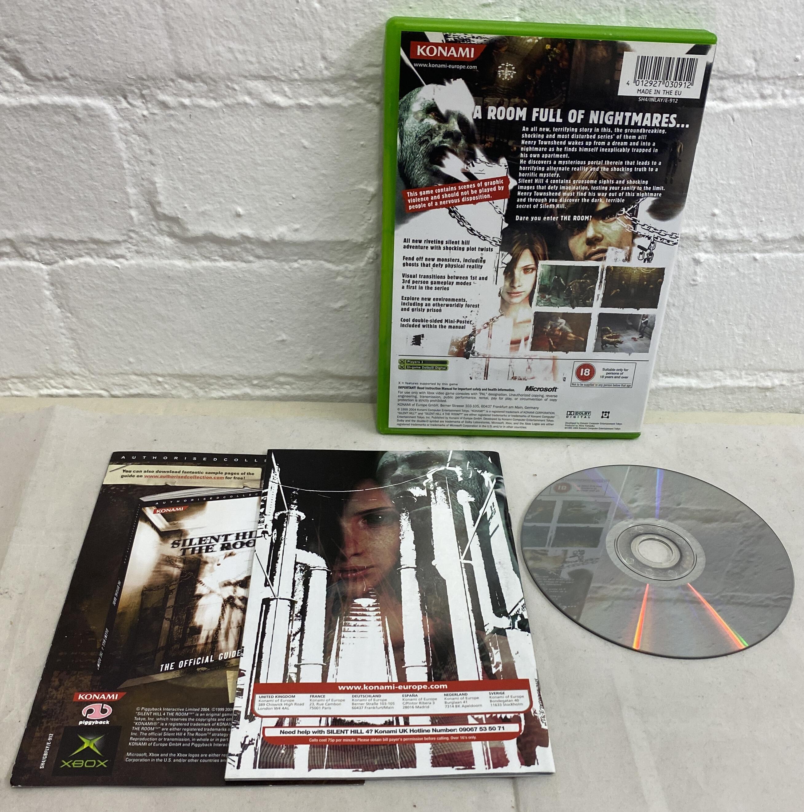 Back cover of Silent Hill 4 The Room Xbox case and disc with manual and insert booklet