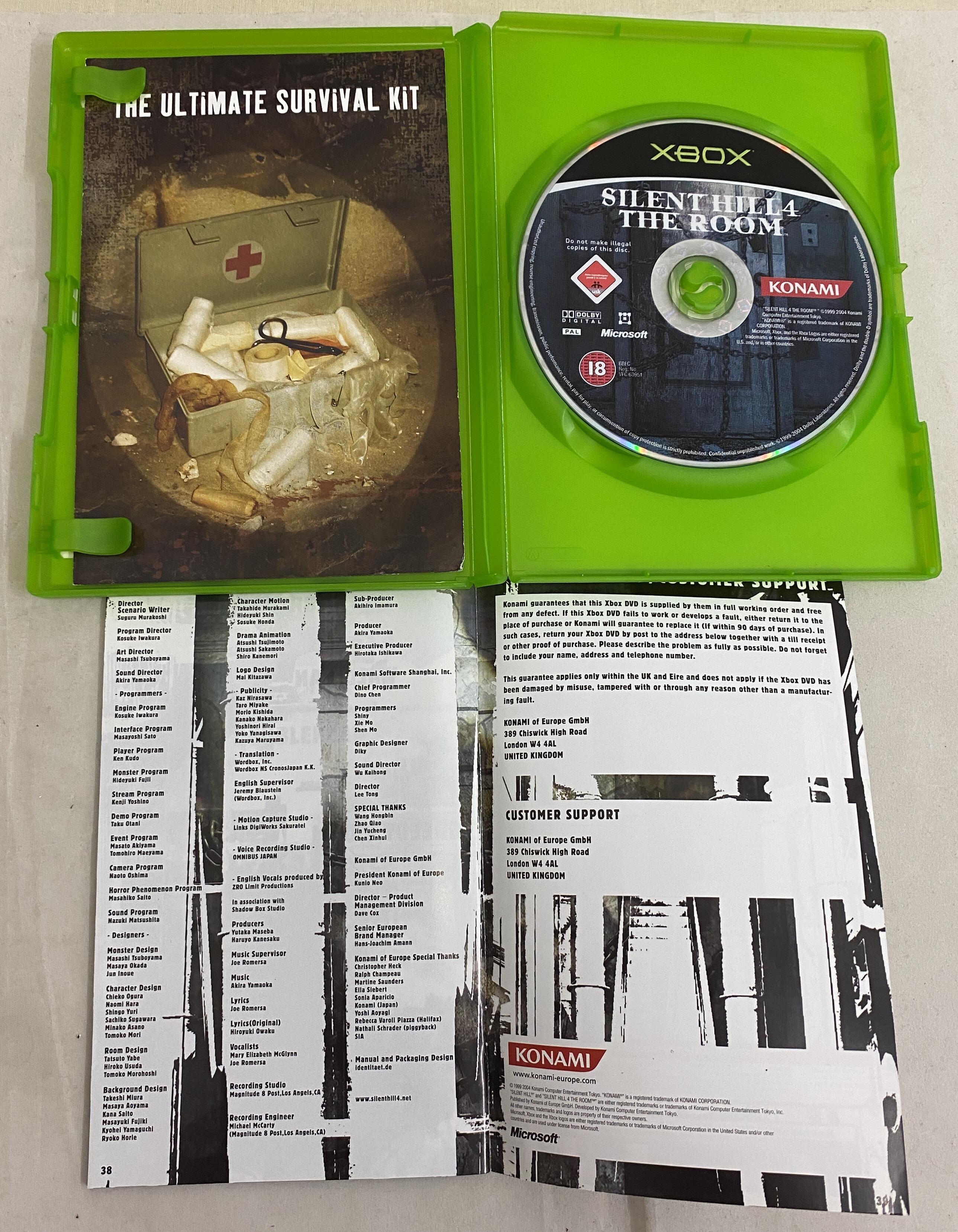 Silent Hill 4 The Room Xbox case and manual back page opened showing condition