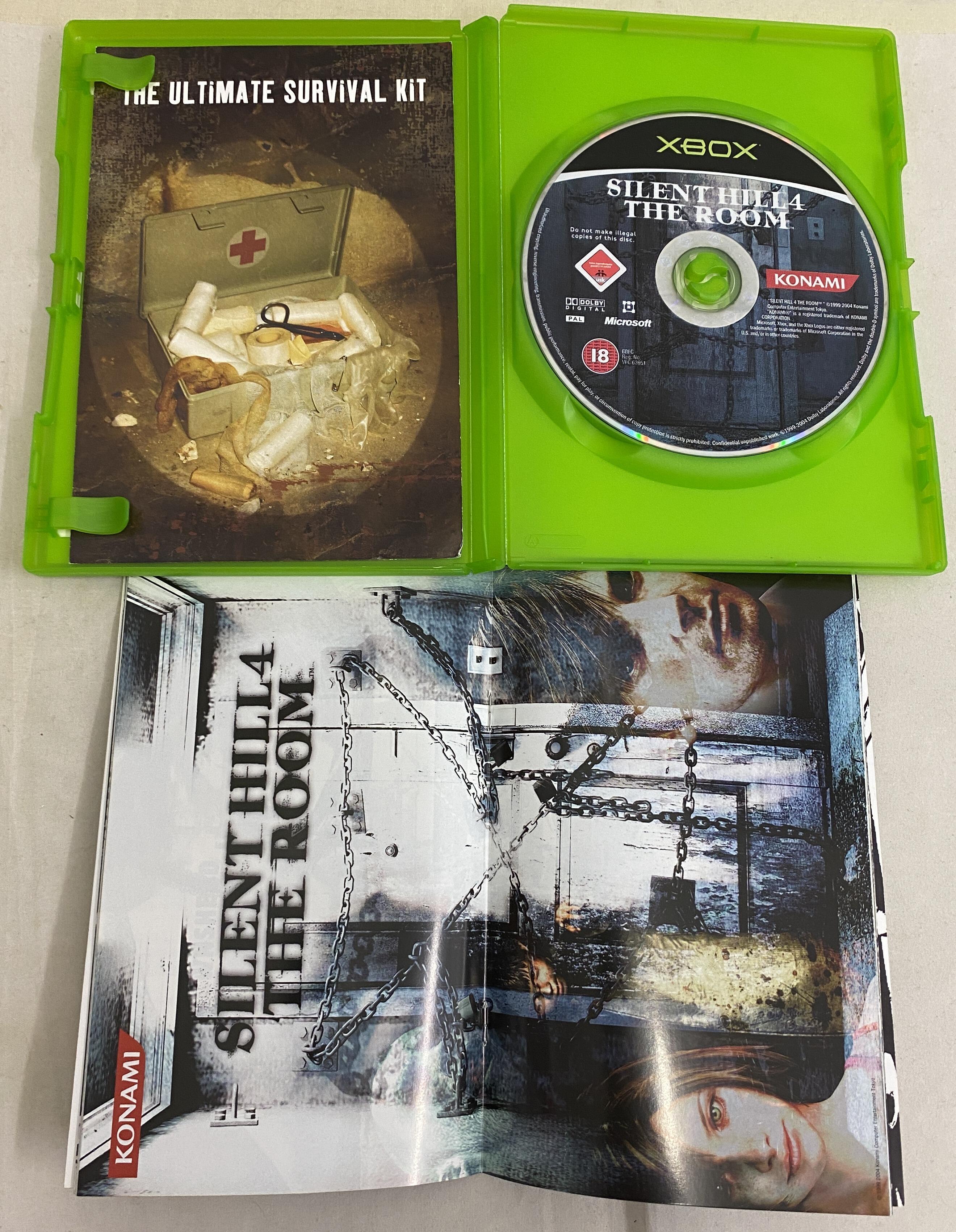 Silent Hill 4 The Room Xbox case and manual centre page opened showing condition