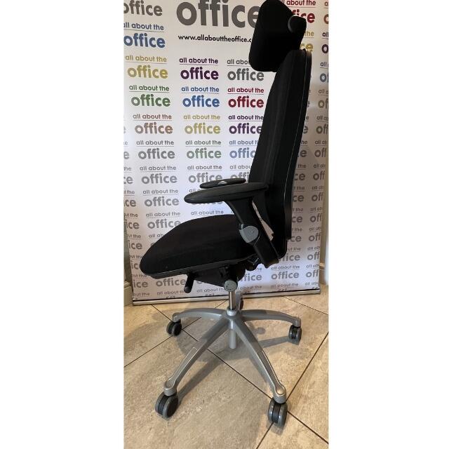 Angled view of refurbished RH400 chair in black fabric