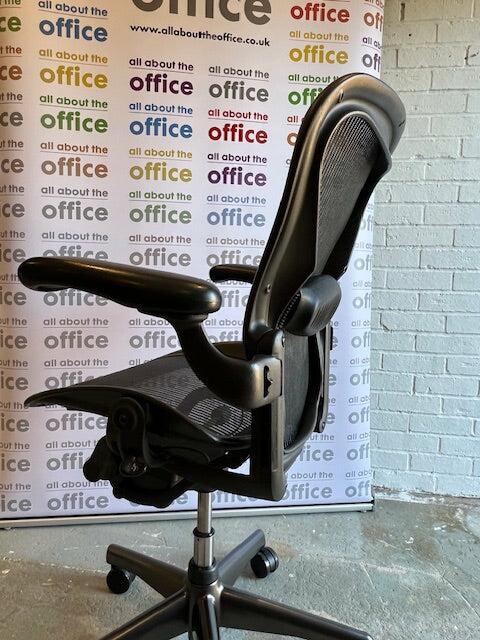 Side view of Herman Miller Aeron Size B chair with tilt and height-adjust functions, refurbished