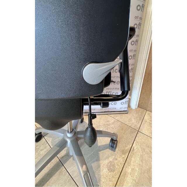 Rear view of RH400 chair highlighting back height adjustment control