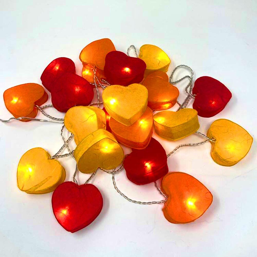 Handcrafted Radiant Heart 30 LED Fairy Lights in the Fire colourway. Hand-screened mulberry paper hearts with warm white LEDs. USB powered. UK 3-Pin USB plug included.
