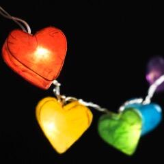 Handcrafted Radiant Heart 20 LED Fairy Lights in rainbow colours. Hand-screened mulberry paper hearts with warm white LEDs. Mains powered. UK plug included.