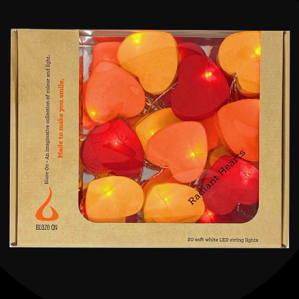 Handcrafted Radiant Heart 30 LED Fairy Lights in the Fire colourway. Hand-screened mulberry paper hearts with warm white LEDs. USB powered. UK 3-Pin USB plug included.