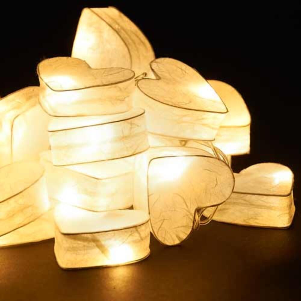 Handcrafted Radiant Heart 10 LED Fairy Lights in crisp white. Hand-screened mulberry paper hearts with warm white LEDs. Mains powered. UK plug included.
