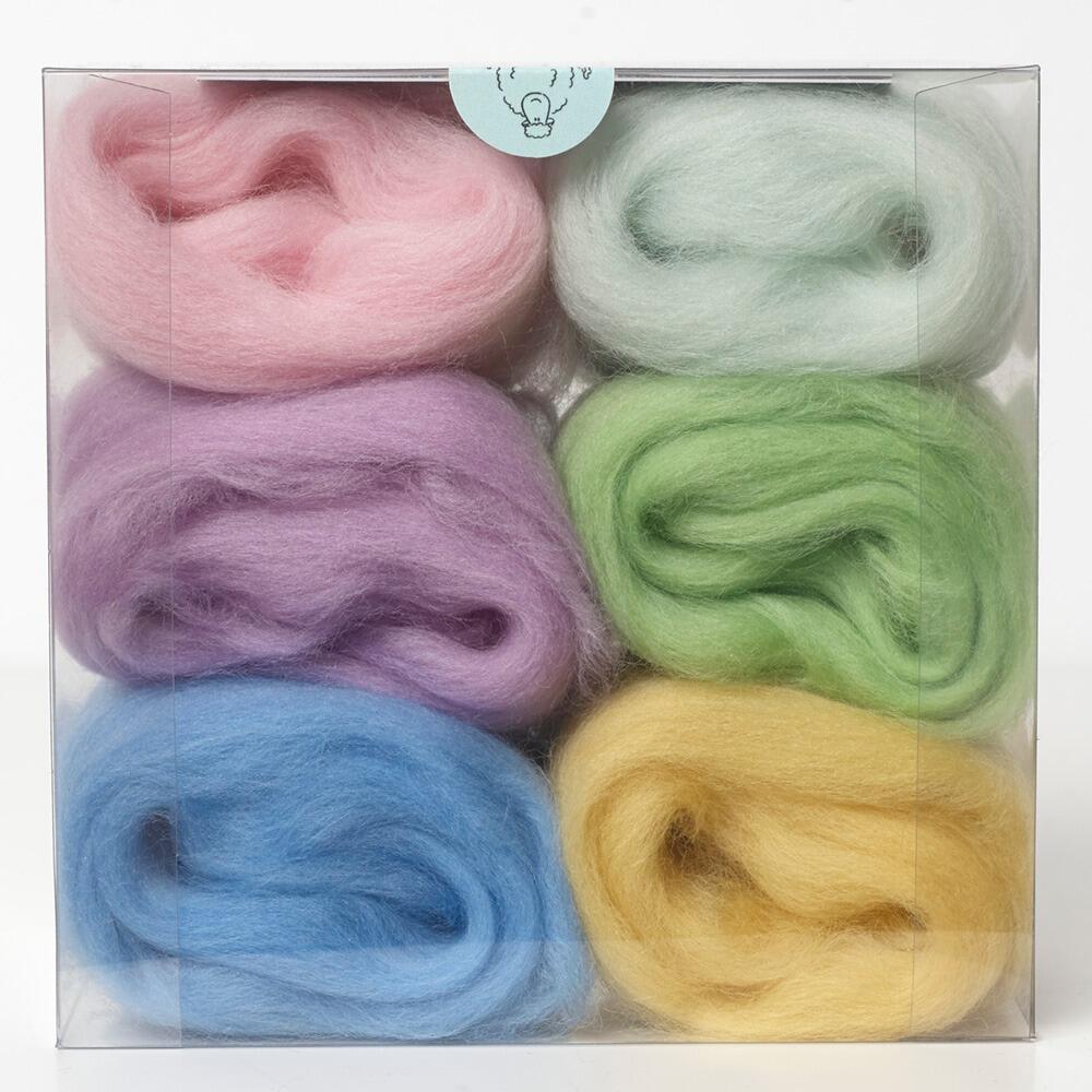 A curated pastels merino wool shade pack containing six 5g portions of non-mulesed wool tops.