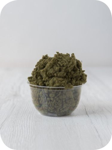 green wool nepps in a 5g portion for adding texture to felting and spinning projects