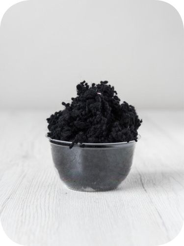 black wool nepps in a 5g portion for adding texture to felting and spinning projects