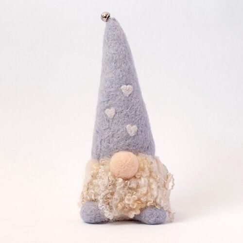 A Nordic-style needle-felted gnome named Gerald with a tall grey hat featuring white hearts, a curly white beard, and a round peach nose.