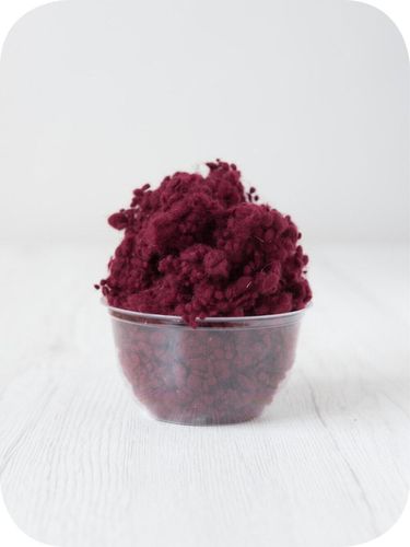soft fruit red wool nepps in a 5g portion for adding texture to felting and spinning projects