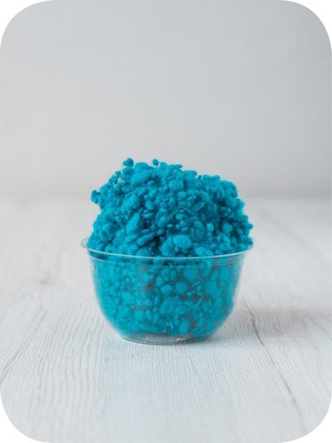 cobalt aqua wool nepps in a 5g portion for adding texture to felting and spinning projects