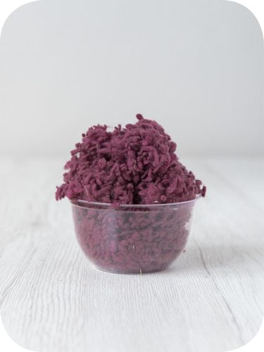 pink wool nepps in a 5g portion for adding texture to felting and spinning projects