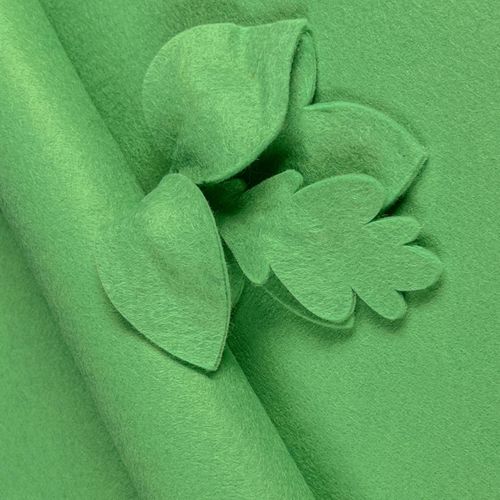 Soft Mint Green wool-blend felt sheet shown with decorative leaf cut-outs, highlighting its smooth matte texture and clean-cut edges.