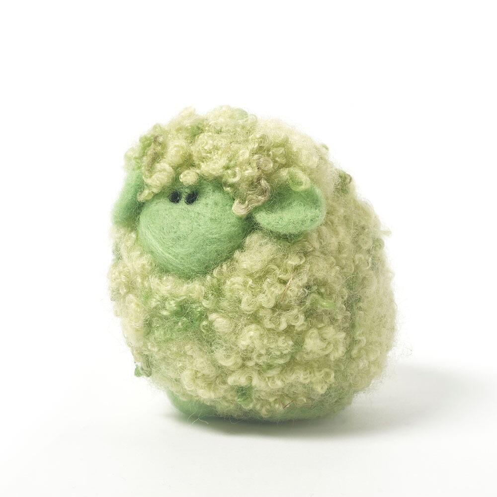 Pistachio the Ice Cream Woollie needle felting kit a finished fluffy green sheep with curly hand-dyed Blue Faced Leicester fleece.