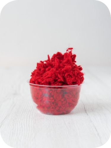 passion red wool nepps in a 5g portion for adding texture to felting and spinning projects