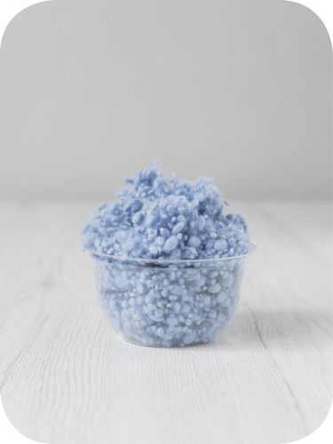 blue wool nepps in a 5g portion for adding texture to felting and spinning projects