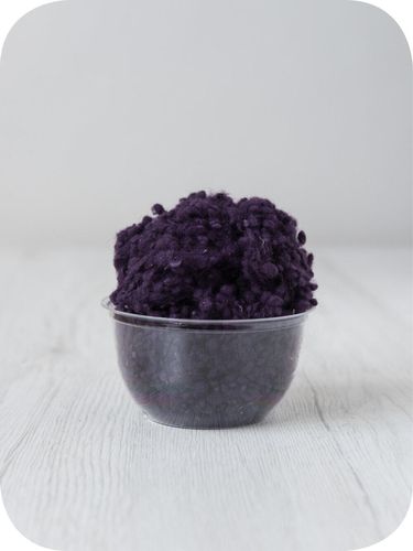 purple wool nepps in a 5g portion for adding texture to felting and spinning projects