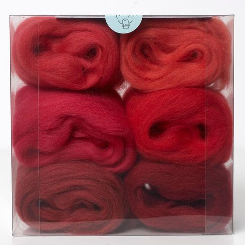 A curated red merino wool shade pack containing six 5g portions of non-mulesed wool tops.
