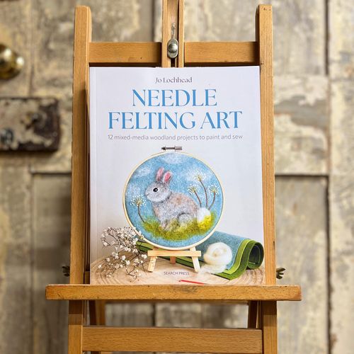 Front cover of Needle Felting Art by Jo Lochhead, a Woollie and Feltie recommended guide for needle felting onto fabric and mixed-media art.