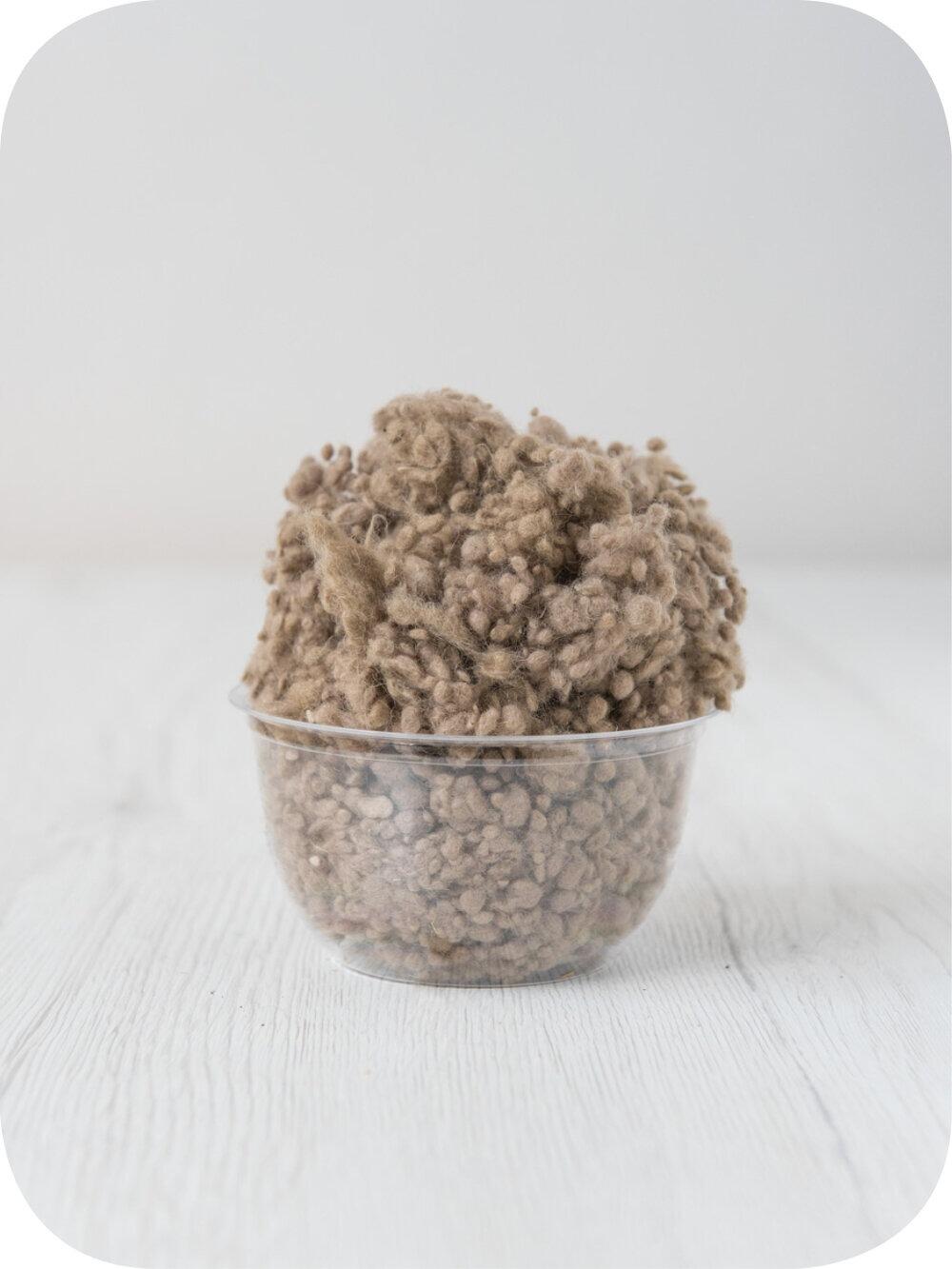 brown wool nepps in a 5g portion for adding texture to felting and spinning projects