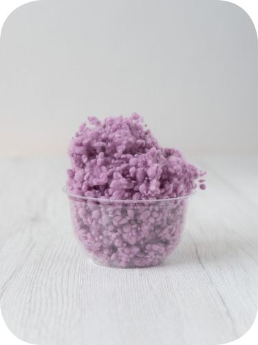 purple wool nepps in a 5g portion for adding texture to felting and spinning projects