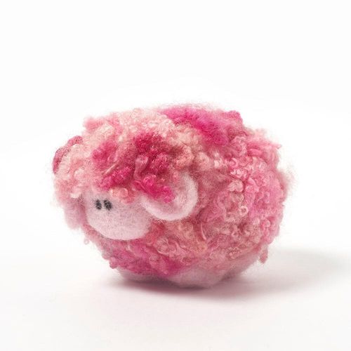 A 3D needle-felted sheep with a thick, curly fleece in variegated shades of strawberry pink.