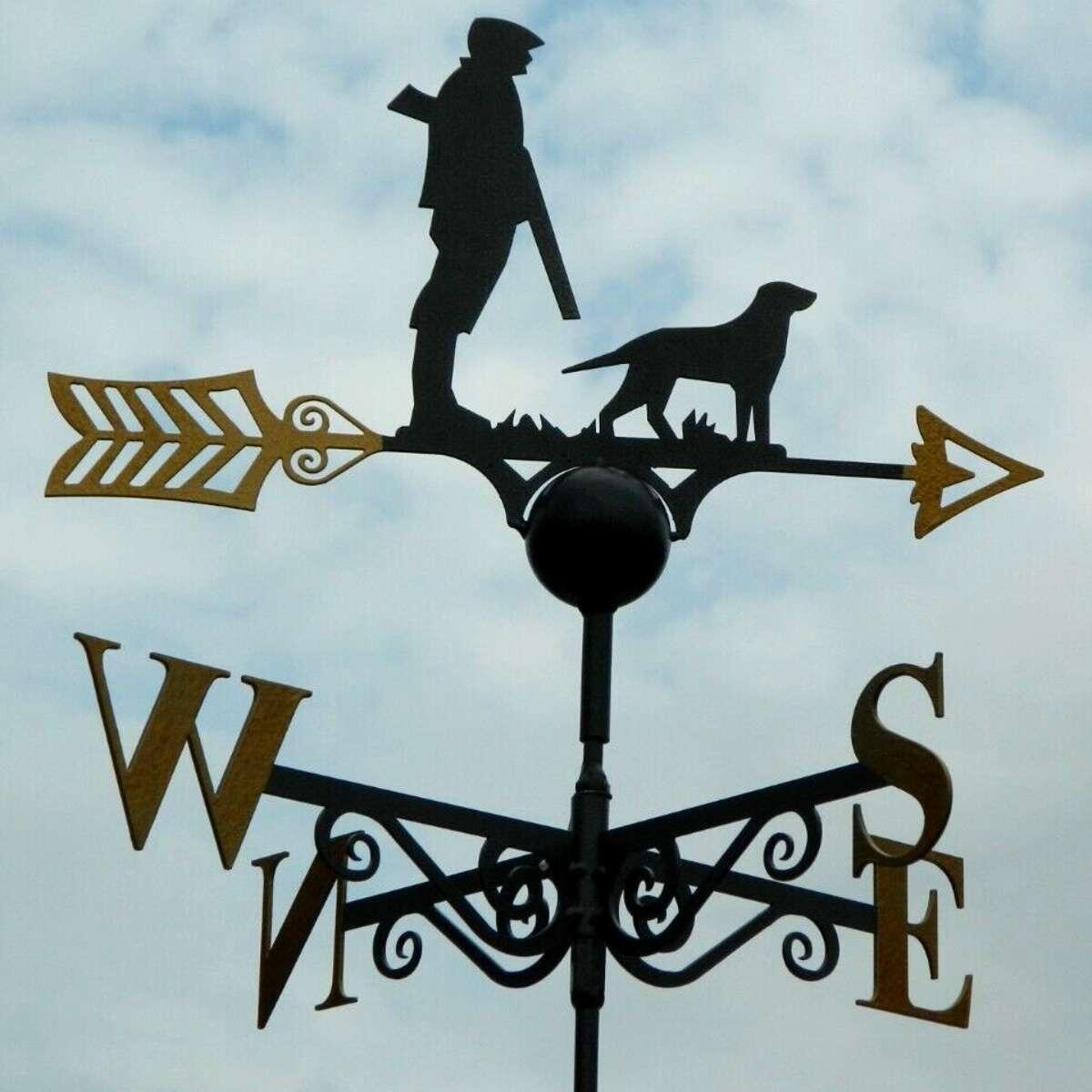 Man and dog hunting weathervane