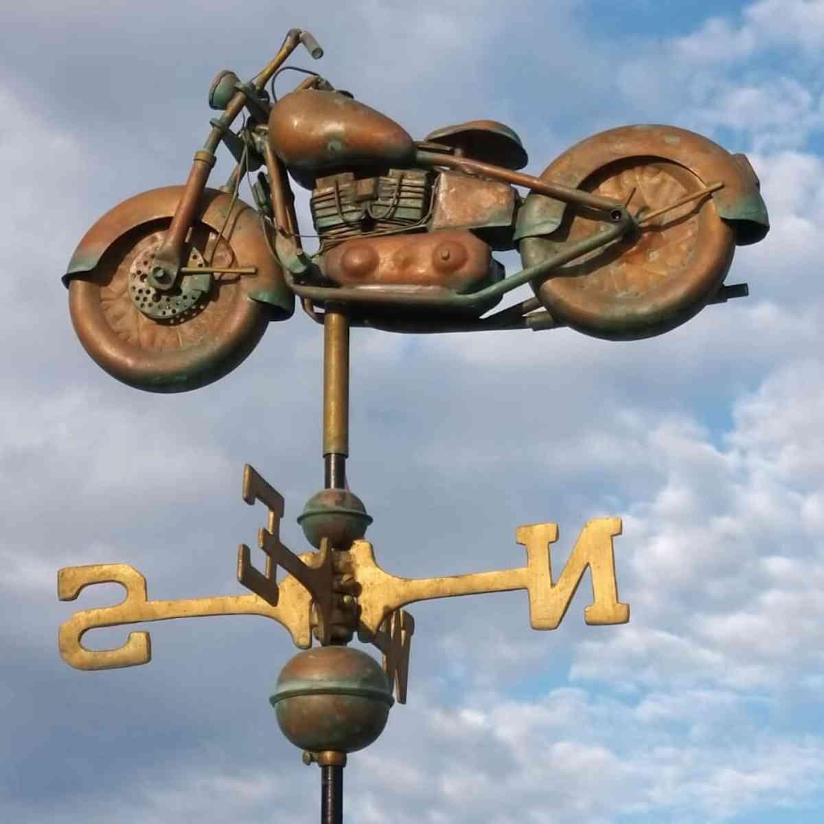Medium aged copper motorcycle weathervane