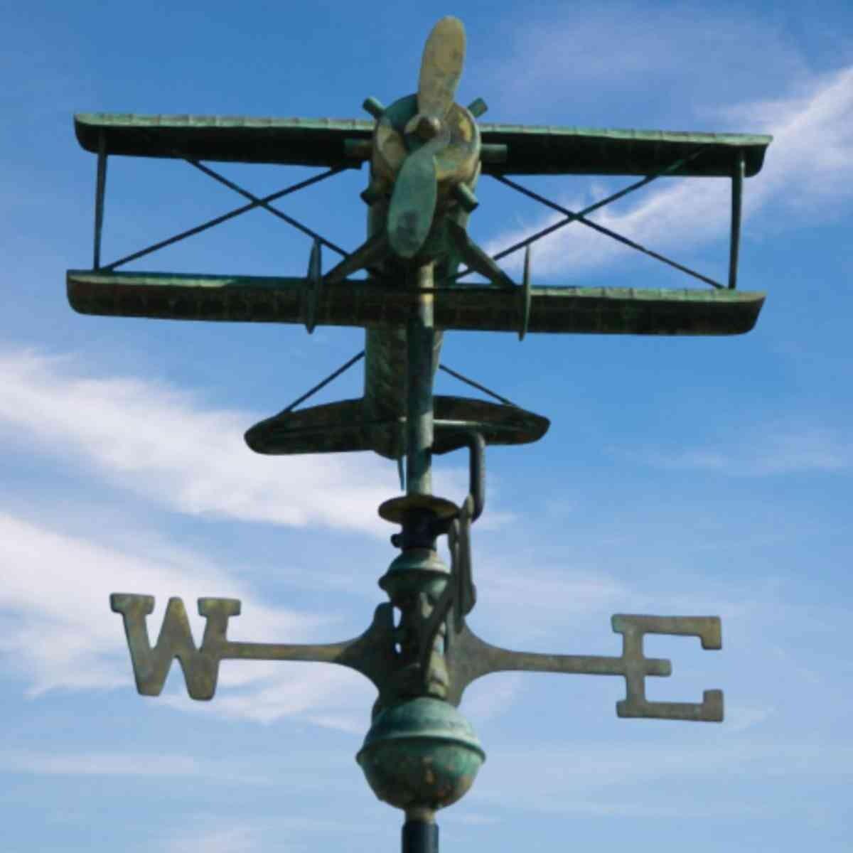 Medium hand crafted copper aged verdigris biplane weathervane