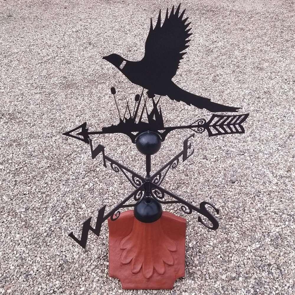 Pheasant weathervane on a ridge tile finial fitting with multiple angle options