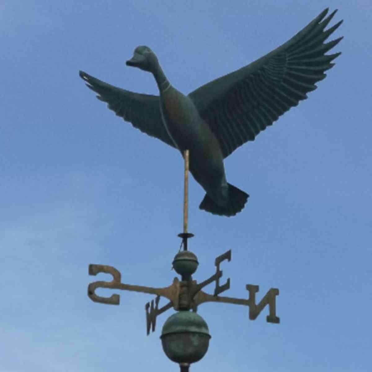 Large copper weathered flying duck weathervane
